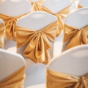 Nơ ghế hội nghị màu vàng đồng sang trọng dùng cho nhà hàng khách sạn sự kiện